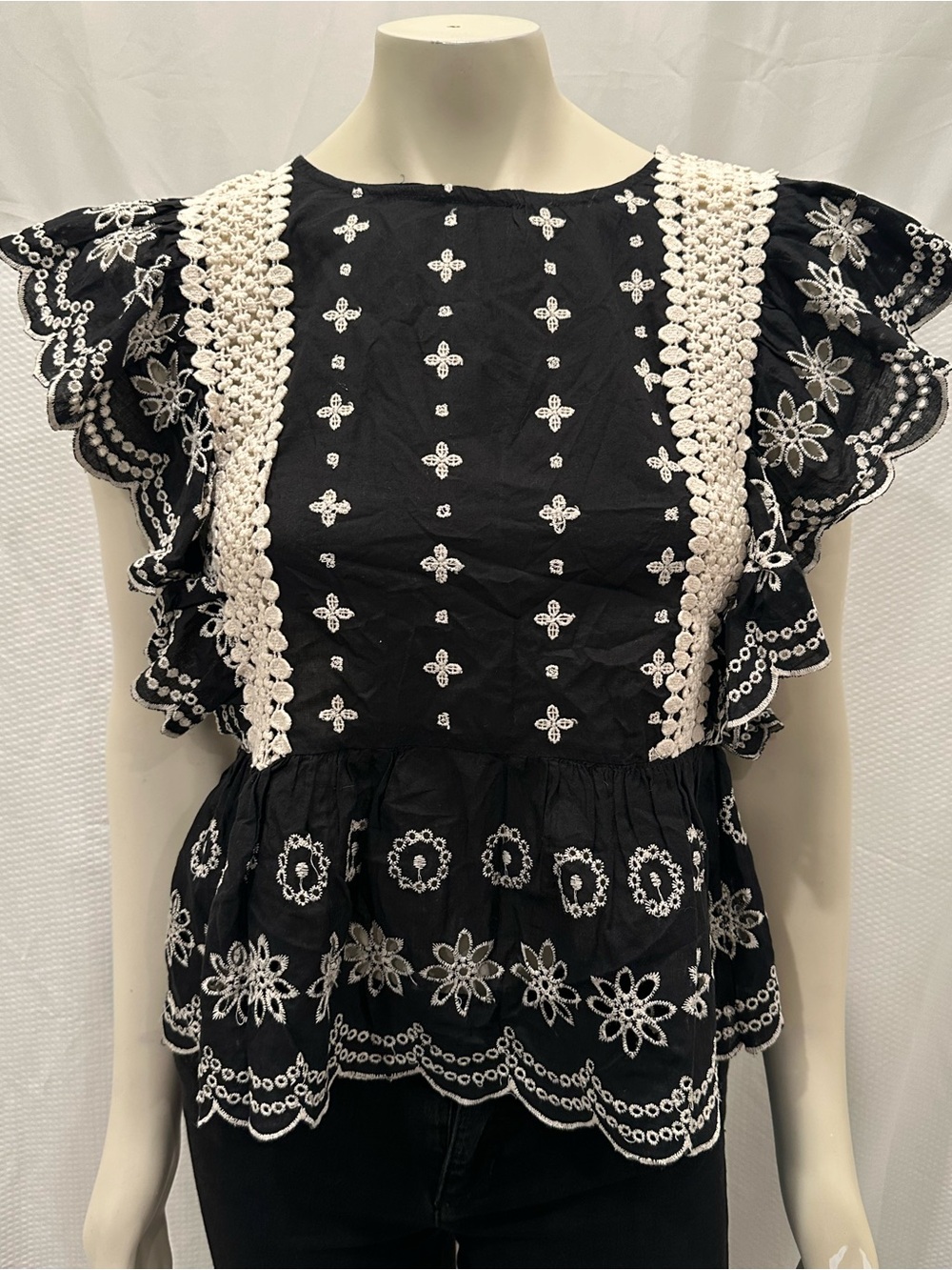 Monograph Black Embroidered Peplum Blouse with Crochet Trim Made in India